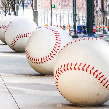 baseball statues on sidewalk