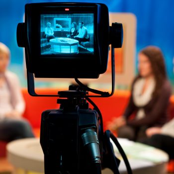 Video camera viewfinder - recording show in TV studio - focus on camera