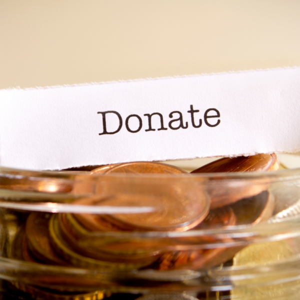 Donate on a piece of paper placed on top of a jar of pennies