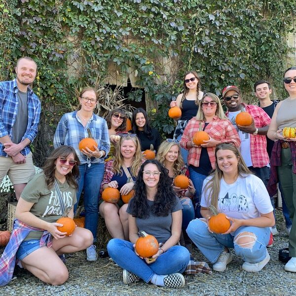 The Scooter Media team posing for a photo at Flannel Fest 2024.